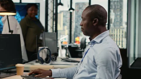 Software developers in startup office work with artificial intelligence Stock Footage 323238445