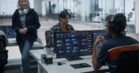 Software Developers Talking in Office Stock Footage 296183177