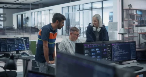 Software Developers Talking in Office Stock Footage 296184042