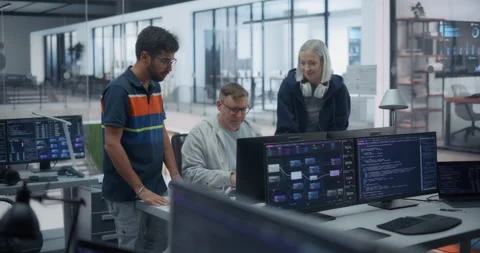 Software Developers Talking in Office Stock Footage 296184046