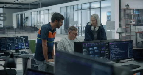 Software Developers Talking in Office Stock Footage 296184084