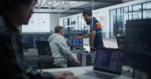 Software Developers Talking in Office Stock Footage 296184396