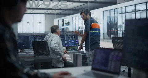 Software Developers Talking in Office Stock Footage 296184480