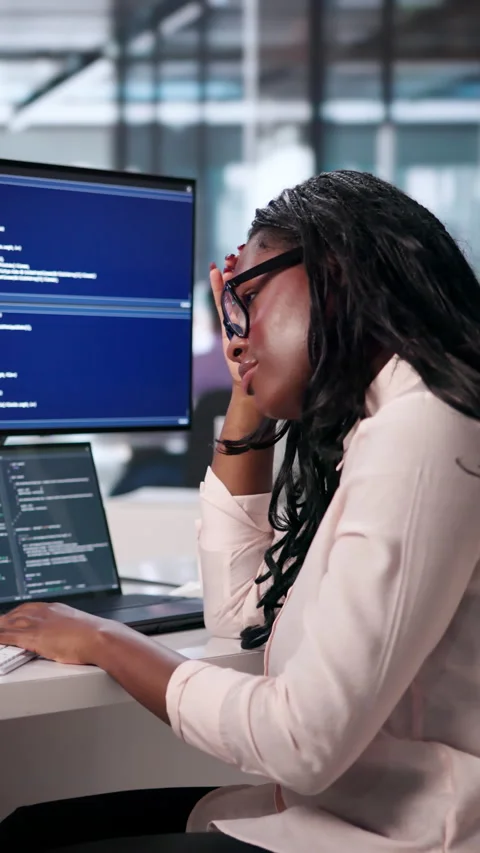 Software Developers Tired And Stressed While Coding Late 動画素材 342984255