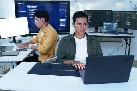 Software Developers Working on Code and Artificial Intelligence Projects Fotos Stock