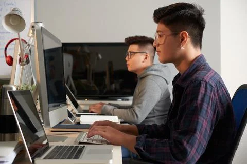 Software Developers Working on Computers Stock Photos