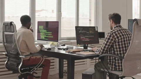 Software Developers Working on PC Computers Stock Footage 165221662