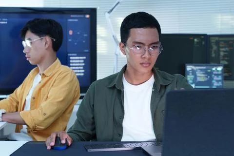 Software Developers Working on Programming and AI Technology Stock Photos