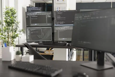 Software developers workspace with digital displays 스톡 사진