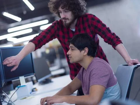 Software developers writing programming code Foto stock