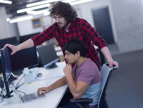 Software developers writing programming code 스톡 사진