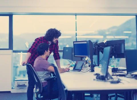 Software developers writing programming code Photos