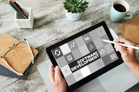 Software development and process automation concept on tablet computer screen. Stock Photos