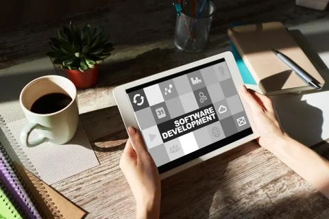 Software development and process automation concept on tablet computer screen. Stock Photos