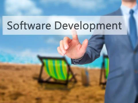 Software Development - Businessman hand pressing button on touch screen inter 스톡 사진