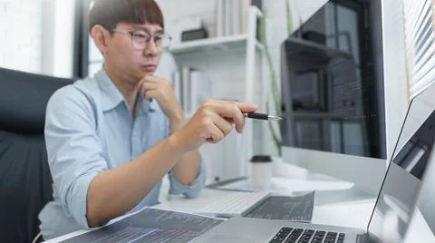 Software development concept, Male programmer pointing on laptop screen to ch 스톡 사진