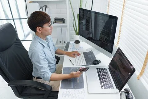 Software development concept, Male programmer check website programming on sm 스톡 사진