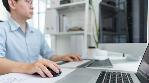 Software development concept, Male programmer typing data code on laptop to d 写真素材