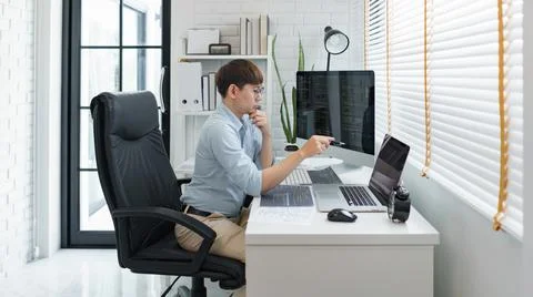 Software development concept, Male programmer pointing on laptop screen to ch 写真素材