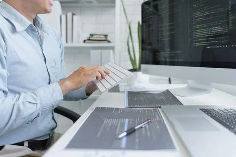 Software development concept, Male programmer using keyboard to typing data c 스톡 사진