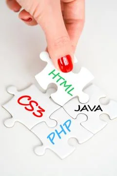 Software development concept with puzzle pieces Stock-Fotos