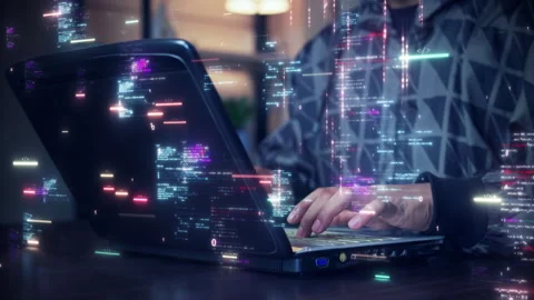 A software development designer or programmer is typing on a computer to cr.. Stock Footage 251325722