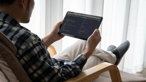 Software development programming on computer screen for modish application Fotos de archivo