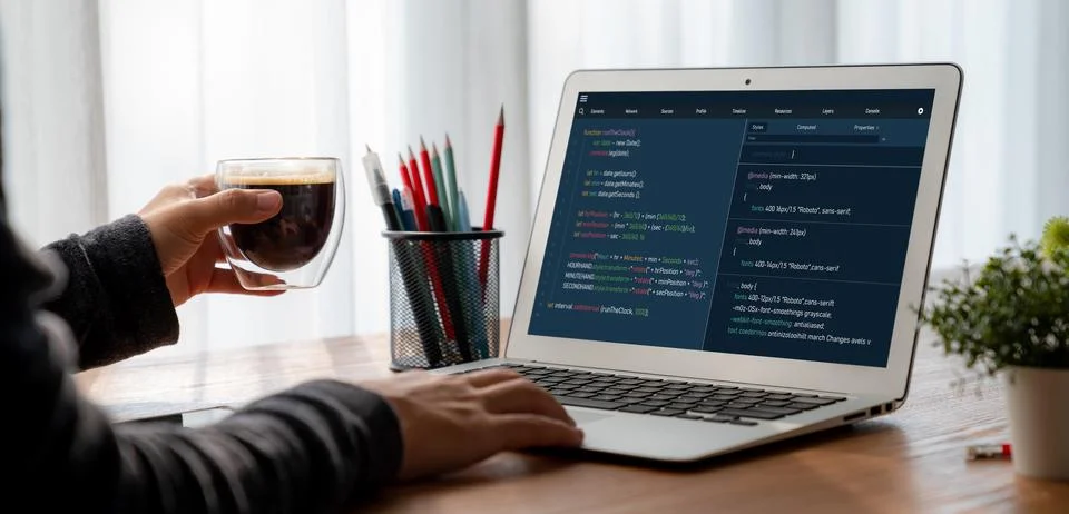 Software development programming on computer screen for modish application Fotos de archivo
