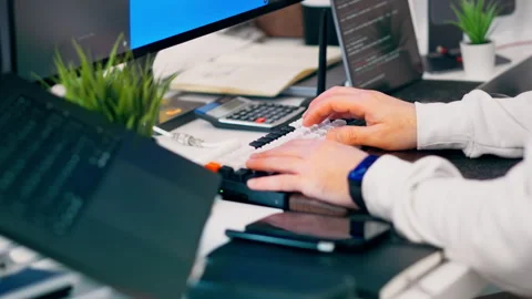 Software development workspace computer coding office desk Stock Footage 329663078