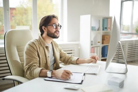 Software engineer analyzing computer error Stock Photos