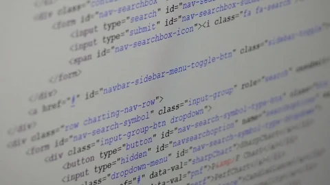 A software engineer browsing code on the computer monitor Stock Footage 89997814