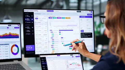 Software Engineer Carefully Monitors AI Workflow On Laptop Stock Footage 345855717