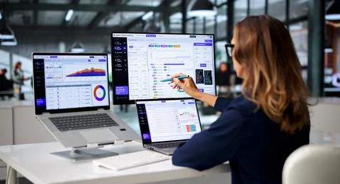 Software Engineer Closely Watches AI Workflow On Laptop, Analyzing Data Caref Stock Photos