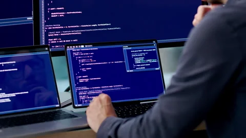 Software Engineer Coding Secure Algorithms On Laptop Stockbeeldmateriaal 340997434