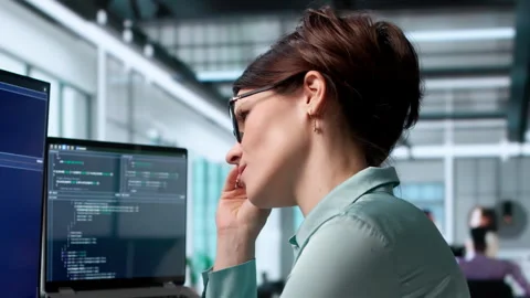 Software Engineer Feeling Tired And Stressed While Coding 動画素材 342978066