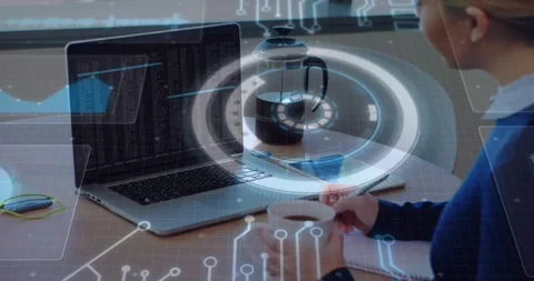 Software engineer grabbing coffee mug then writing code and causing hologram Stock Footage 329425262