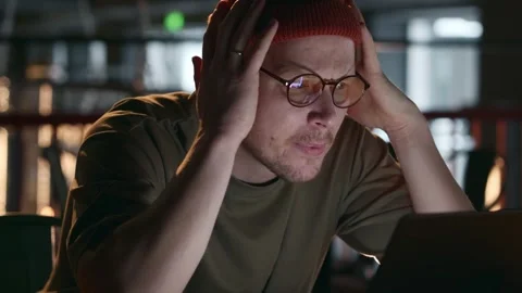 A software engineer has found bugs in the code and is very disappointed Stock Footage 258971337