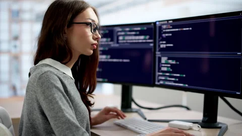 Software Engineer Intently Typing Code Fast Stock Footage 334532101