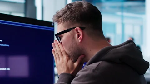 Software Engineer Looks Tired And Stressed While Coding Stock Footage 340997307
