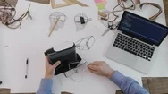 Software Engineer Plugs In Vr Headset And Checks The Code Stock Footage