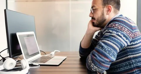 Software engineer programming in office 스톡 사진