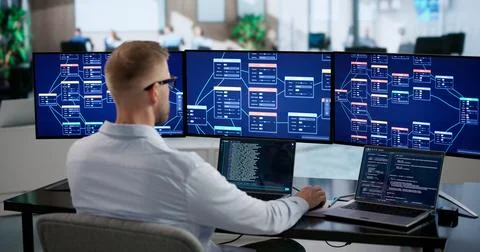 Software Engineer Rapidly Developing Apps Using Low-code Platform Tools. Stock Photos
