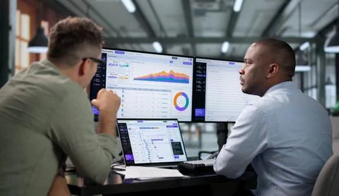 Software Engineer Reviews AI Platform Workflow While Monitoring Performance C Stock-Fotos