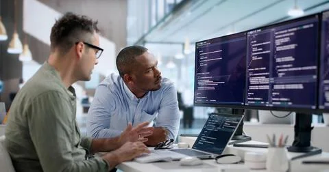 Software Engineer Reviews Code Carefully To Enhance Company Security Systems. Stock Photos