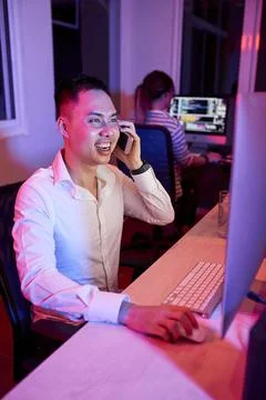 Software Engineer Talking on Phone 스톡 사진