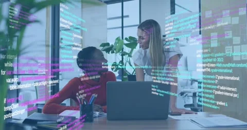 Software engineer typing code with overlay, coworker approaching reviewing Stock Footage 318046200