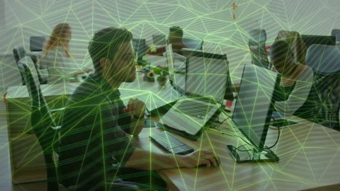 Software engineer typing on PC in open-plan office, showing animated code graph Stock Footage 308658497