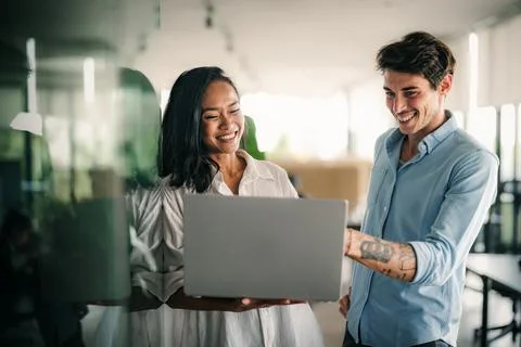Software engineer using laptop computer with global network connection Stock Photos