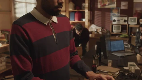 Software Engineer Using Laptop in Old School Garage Office Stock Footage 263304150