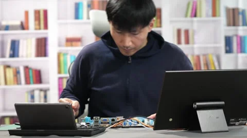 Software Engineer working on an Artificial Intelligence program Stock Footage 295394998